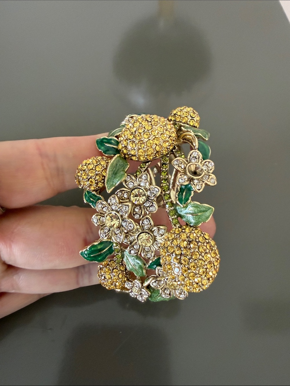 Gold-Tone Yellow Crystal Floral Bracelet with Green Enamel Leaves